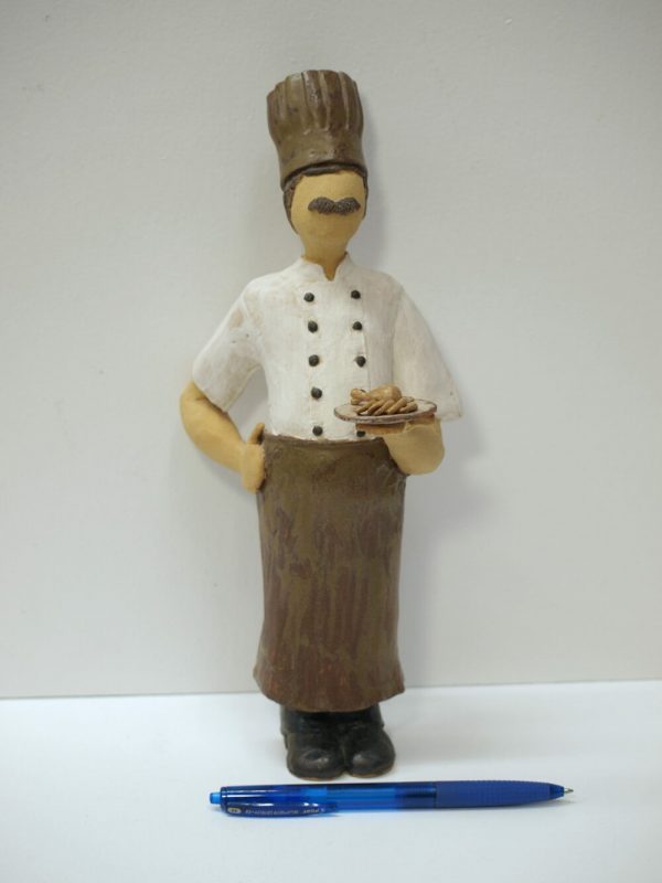 Escultura cerámica de un cocinero