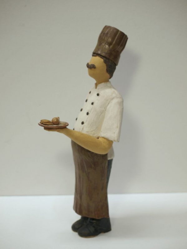 Escultura cerámica de un cocinero